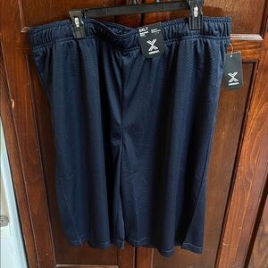 Men’s 2XLT brand is XERSION navy blue basketball shorts regular fit